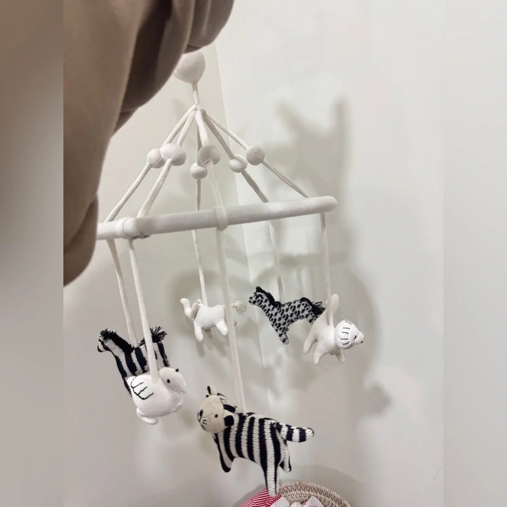 Crate & Barrel Baby Nursery safari animals mobile crib decor newborn neutral